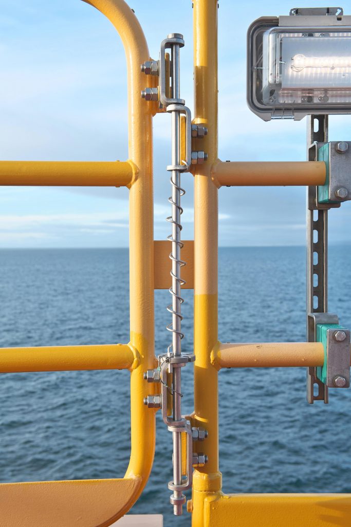 offshore spring closer installed on a yellow offshore platform.