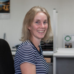 Picture of woman looking into camera and smiling