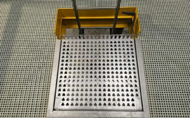Internal ladder hatch self-closing
