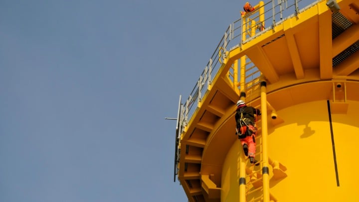 offshore worker climbing platform ladder